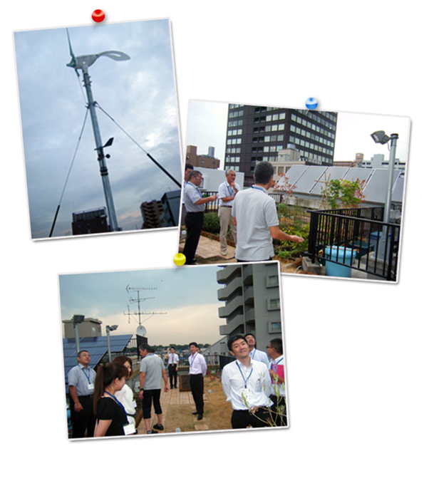 屋上の風力発電機です。屋上緑化の案内をしていただいています。コミュニケーションの場としても活躍しています。